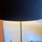 vintage mid-century walnut floor lamps with sculptural reed-inspired bases and black drum shade.