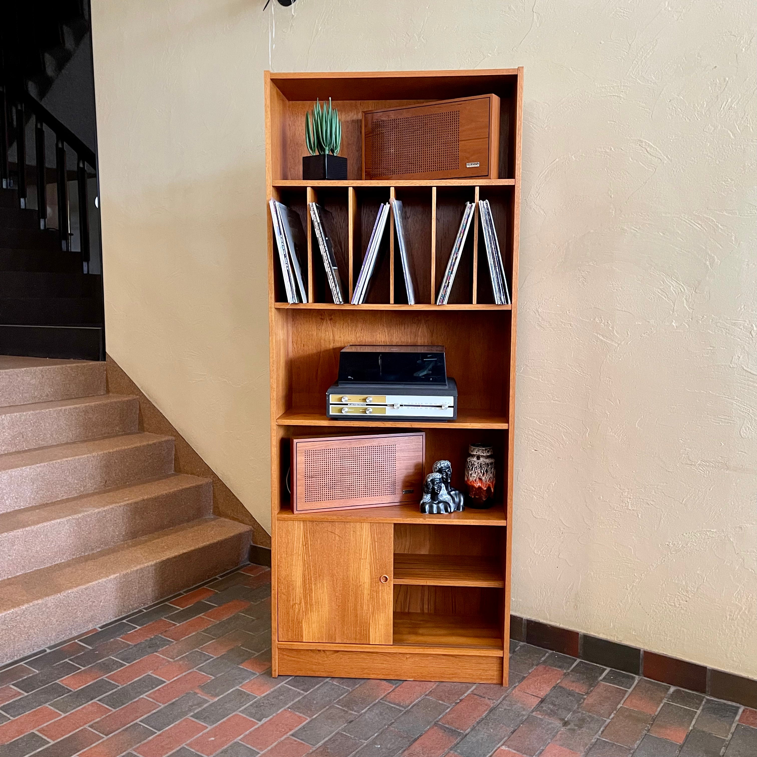 "Made in Denmark," this shelving unit not only provides a stylish platform to showcase your cherished records or favorite books but also offers functional storage solutions. 