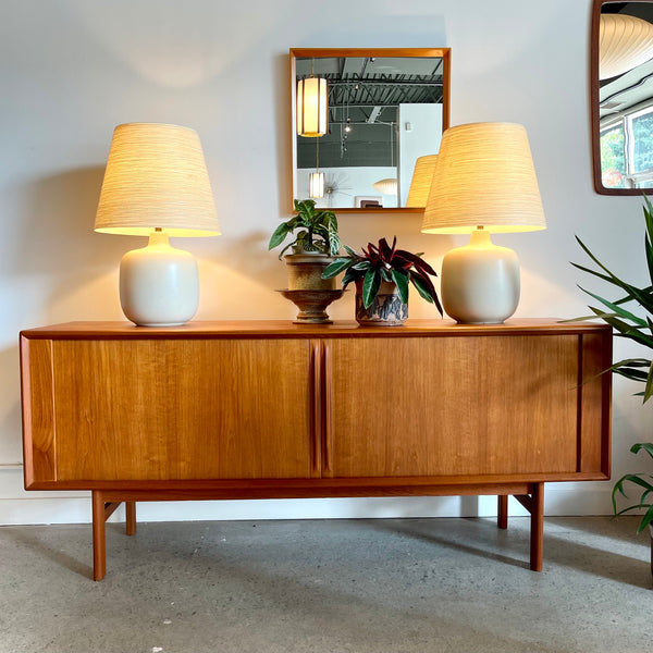 Danish Teak Tambour Door Credenza By Bernhard Pedersen & Sons.  This credenza features a unique tambour door design. 