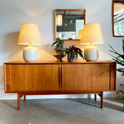 Danish Teak Tambour Door Credenza By Bernhard Pedersen & Sons.  This credenza features a unique tambour door design. 