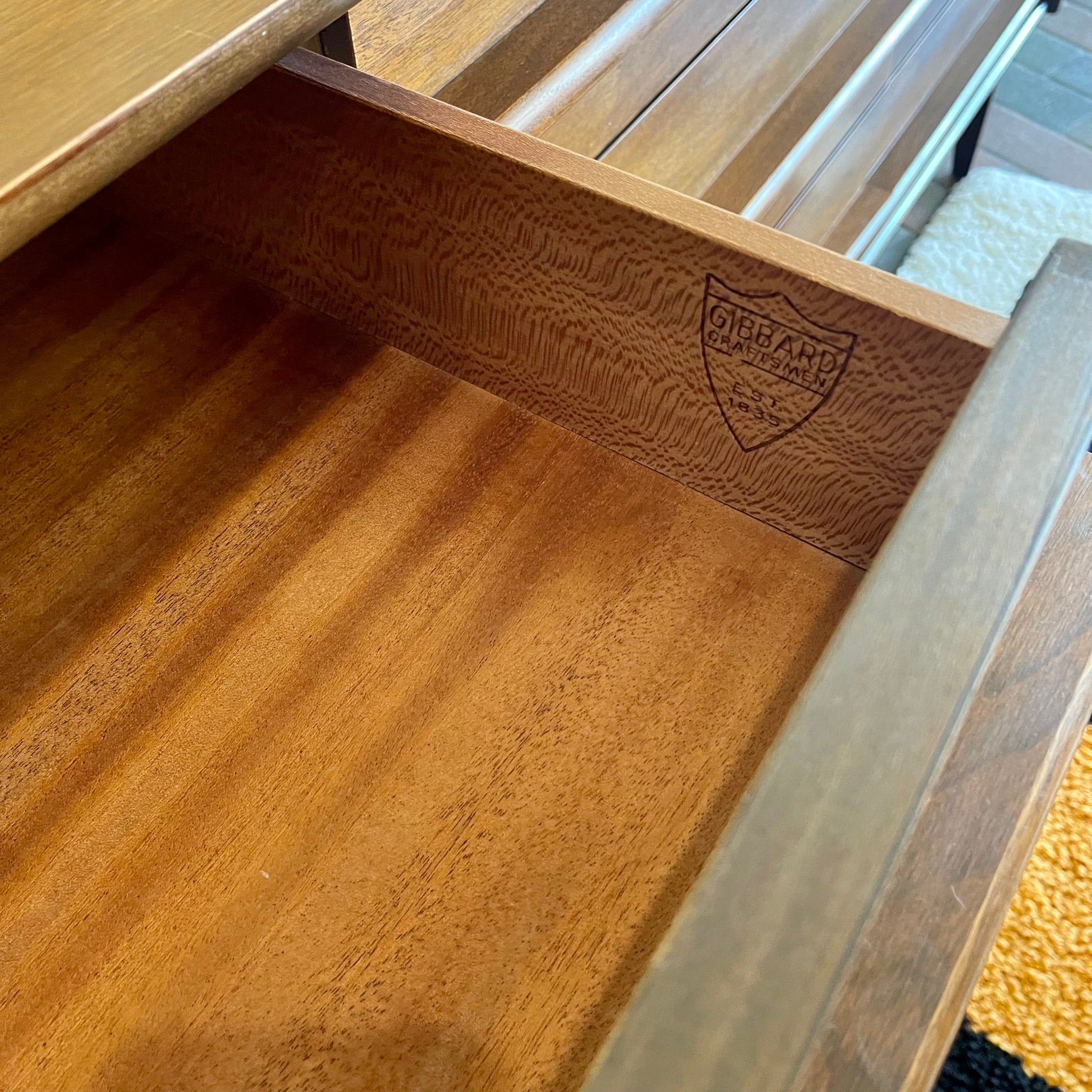 Drawer construction detail  and maker mark on GIBBARD walnut dresser