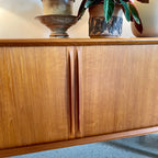 Sliding tambour door detail on Bernhard Pedersen teak credenza