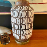 Load image into Gallery viewer,  Mid Century Modern Pottery Lamp. Beautiful glazed geometric shapes adorn this pottery lamp. The  under glaze is black with brown specs and white glaze contrasting the shapes. | Mr. Mansfield Vintage 
