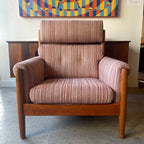 Front view of mid-century Danish teak lounge chair with striped upholstery