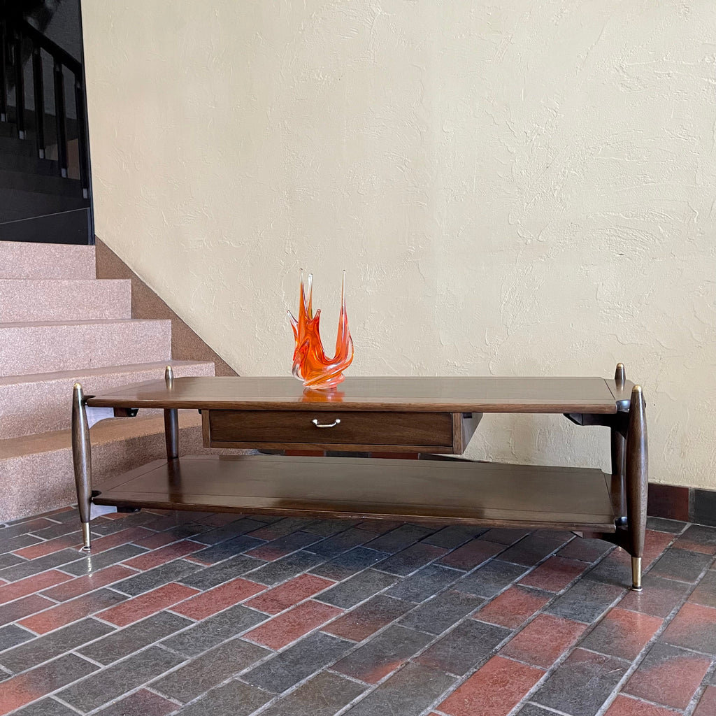 Vintage Canadian-made walnut and mahogany coffee table with long mid-century profile