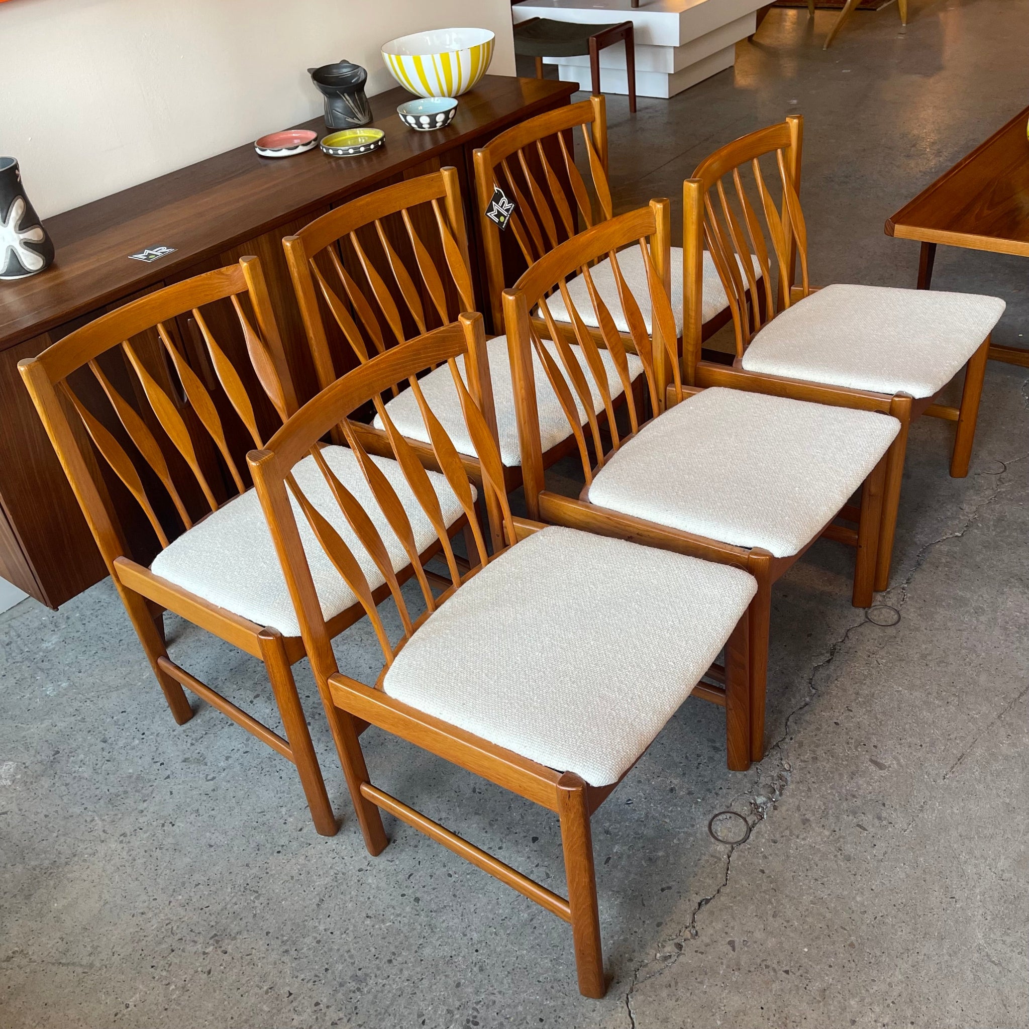 Set of six solid teak dining chairs