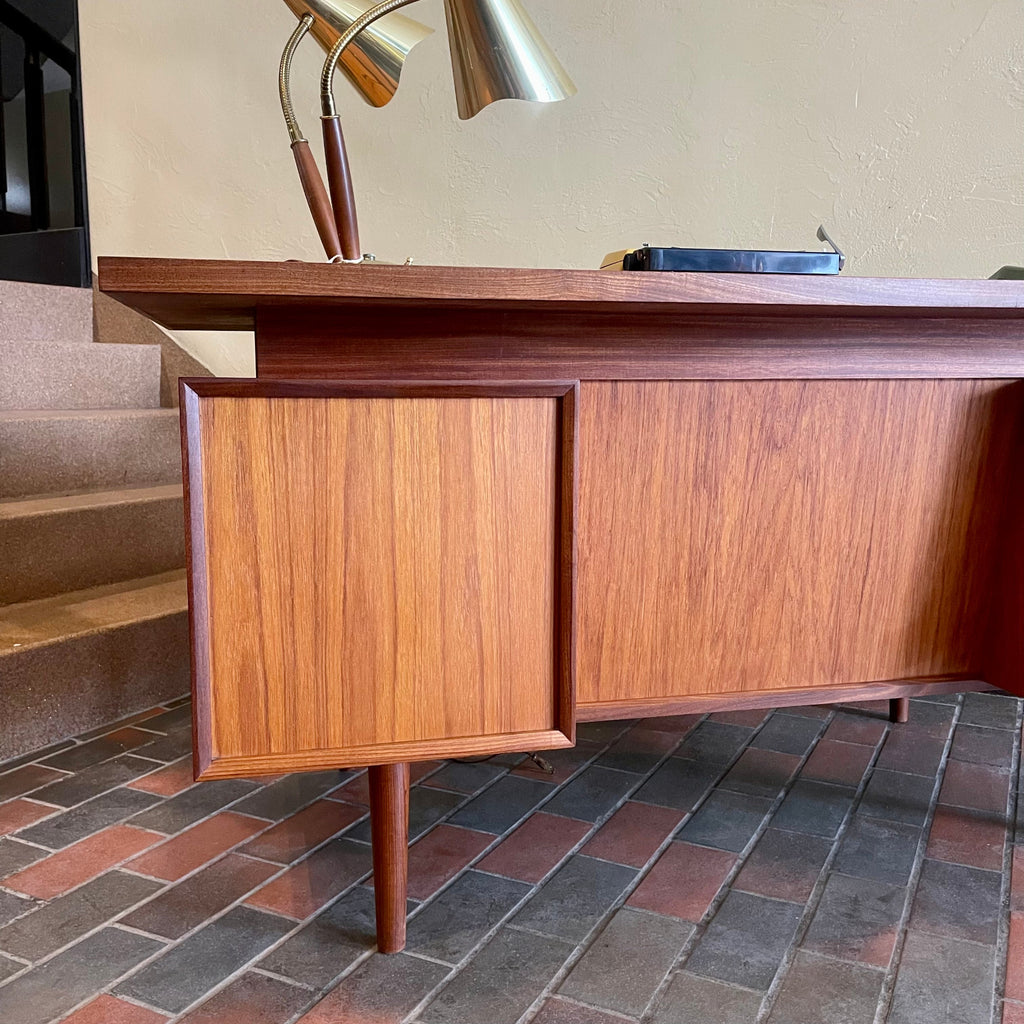 Finished back detail on RS Associates mid-century executive teak desk