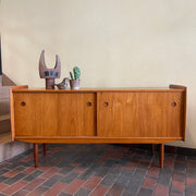 Mid century Modern R. Huber Teak Atomic Age Style Credenza with two sliding doors adjustable shelving and a drawer for storage | Record Storage | Mr. Mansfield Vintage 