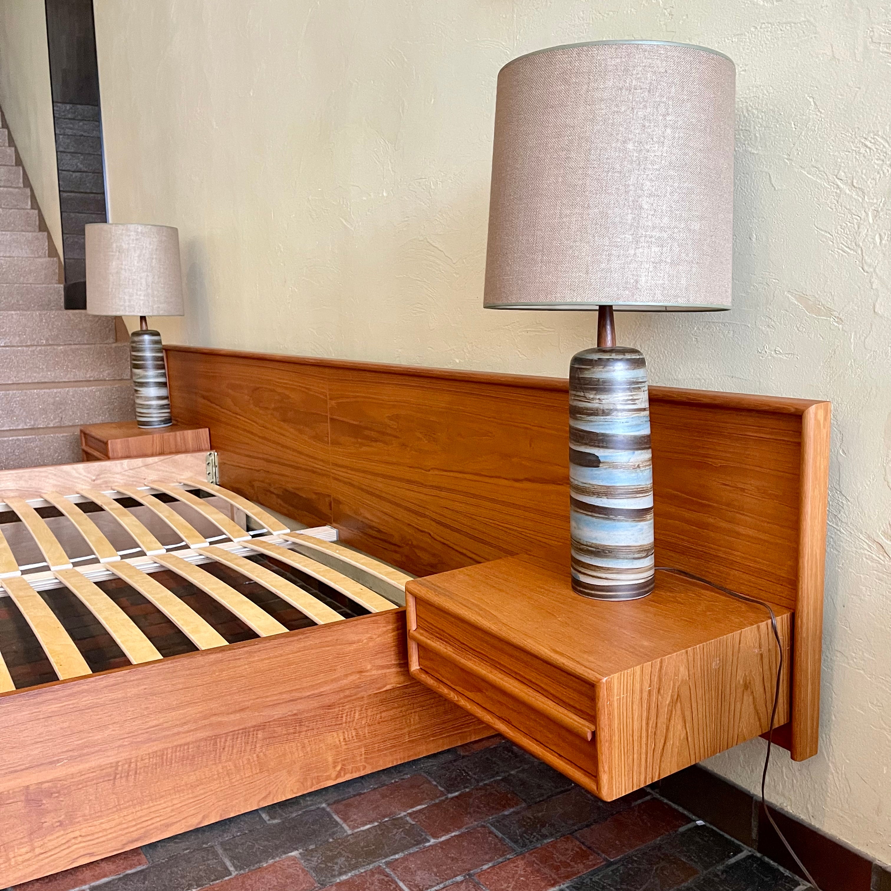 The centerpiece of any bedroom, this platform bed features a clean, minimalist design with a low-profile frame that offers a sense of spaciousness. The headboard, showcasing the natural beauty of teak, adds a touch of organic allure to the overall aesthetic. Its seamless integration with the floating nightstands on both sides creates a cohesive and balanced look.