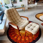 Above view of Beige Huber scoop chair with a curved sculptural shape, upholstered seat, and classic vintage modern design.