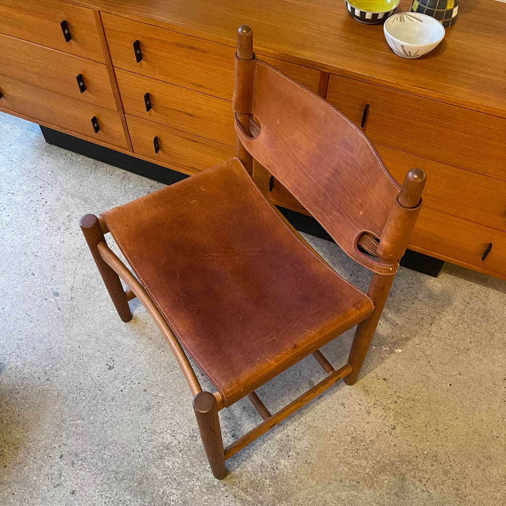 Top view of Borge Mogensen Spanish chair with leather seat and solid wood frame