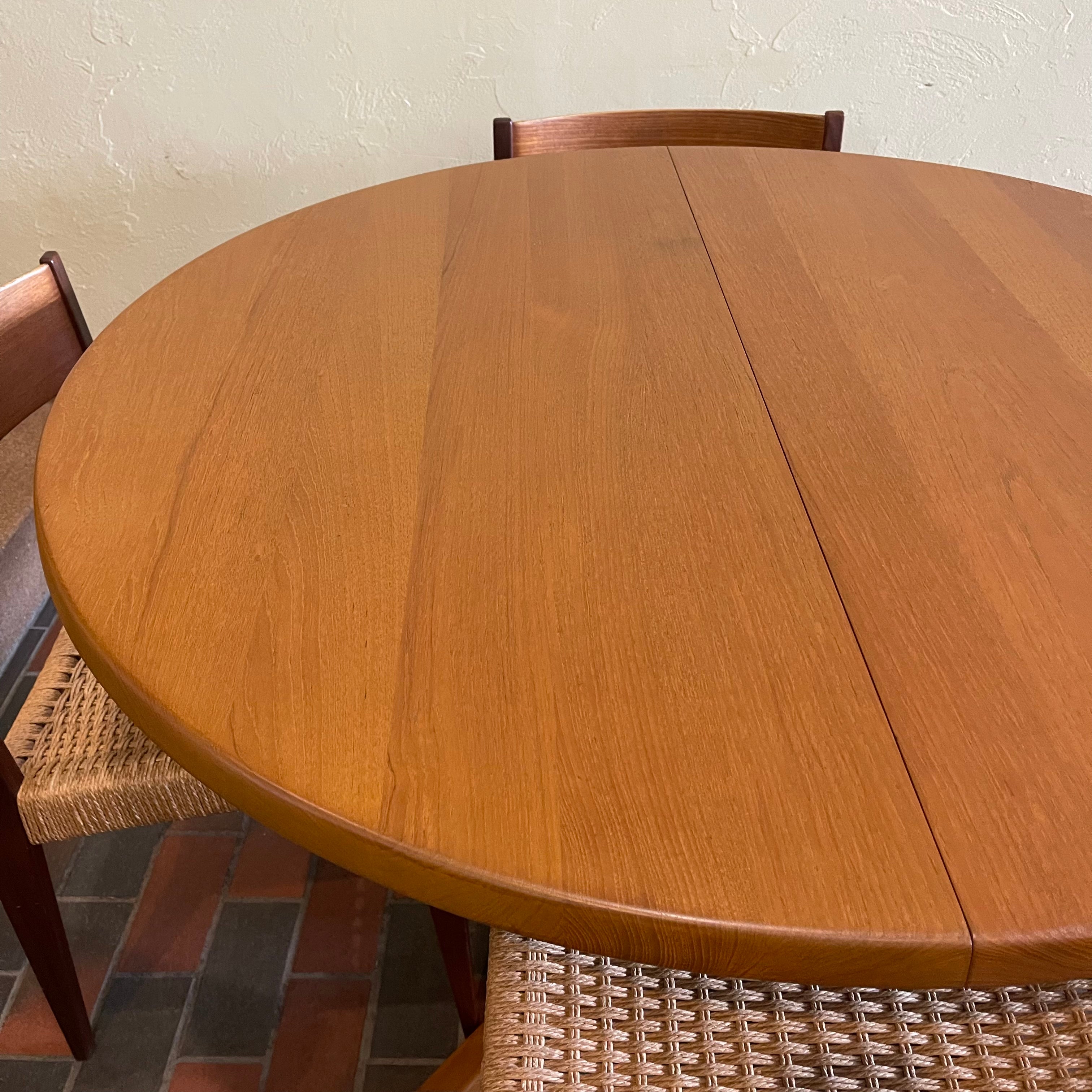 Solid Danish Teak Dining Table by Niels Bach