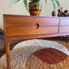 Designed by renowned Danish designer Kai Kristiansen, this piece embodies the clean lines, functional elegance, and exquisite craftsmanship characteristic of Scandinavian furniture design.