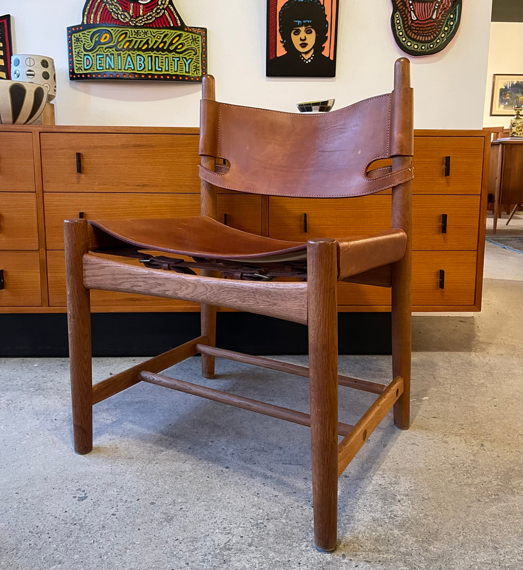 Front view of Borge Mogensen Spanish chair with leather seat and solid wood frame