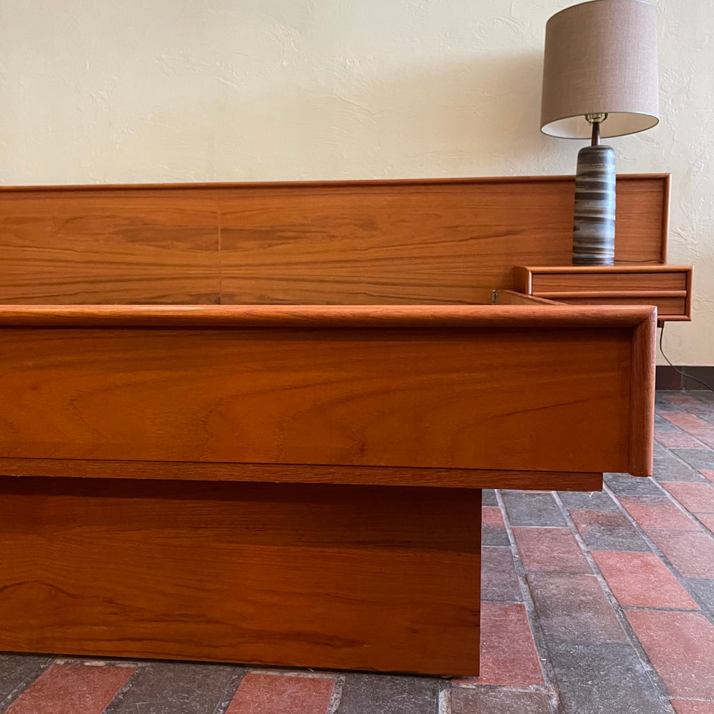 The centerpiece of any bedroom, this platform bed features a clean, minimalist design with a low-profile frame that offers a sense of spaciousness. The headboard, showcasing the natural beauty of teak, adds a touch of organic allure to the overall aesthetic. Its seamless integration with the floating nightstands on both sides creates a cohesive and balanced look.