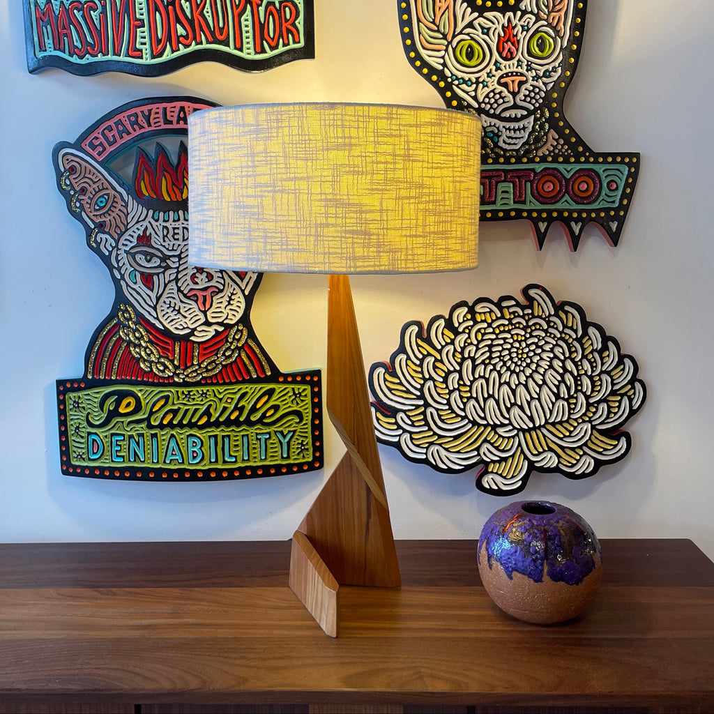 Vintage sculptural wood table lamp with angular base and textured white drum shade