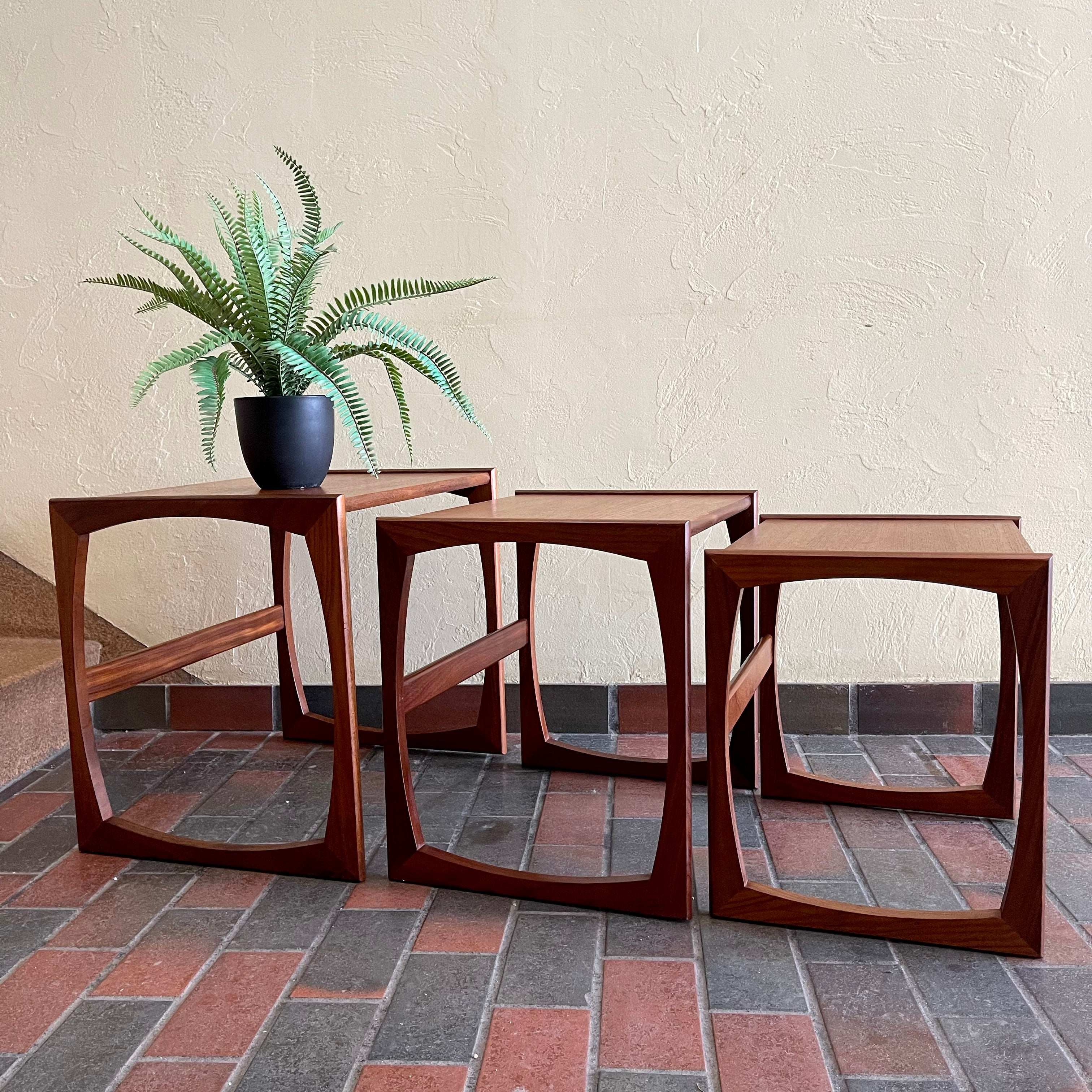 Vintage Nesting Tables by E. Gomme for G-Plan Perfect for adding versatility to any living space, these nesting tables offer both style and functionality, serving as side tables or separate accents. 