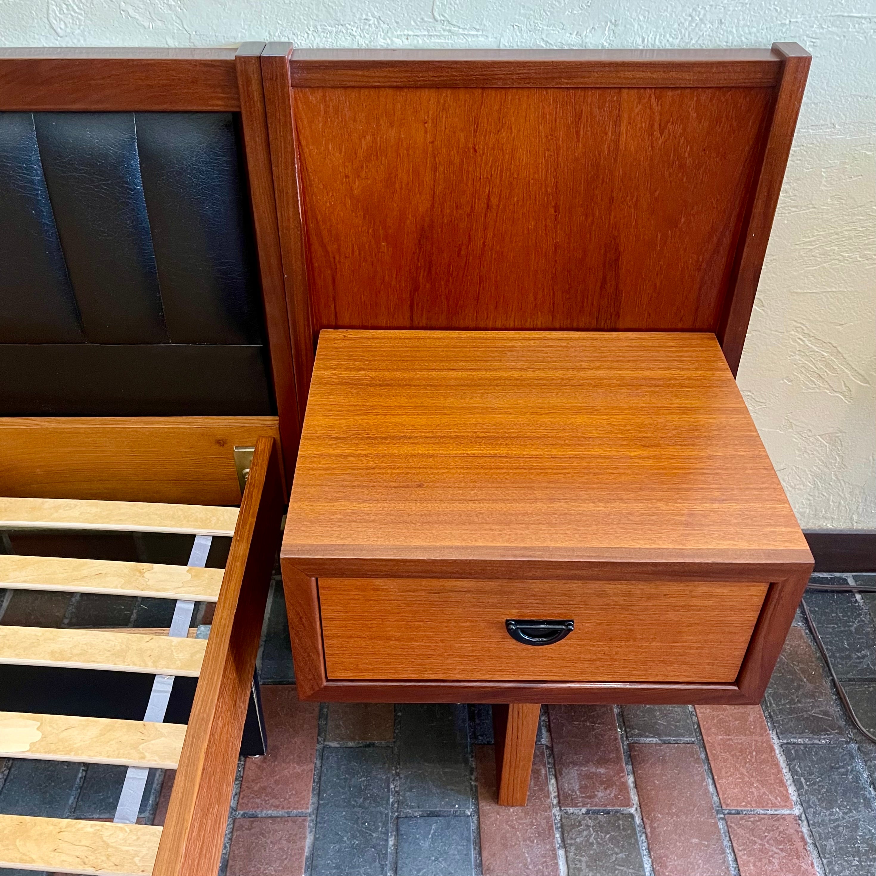 Close-up of warm teak grain on R.S. Associates mid-century bed headboard