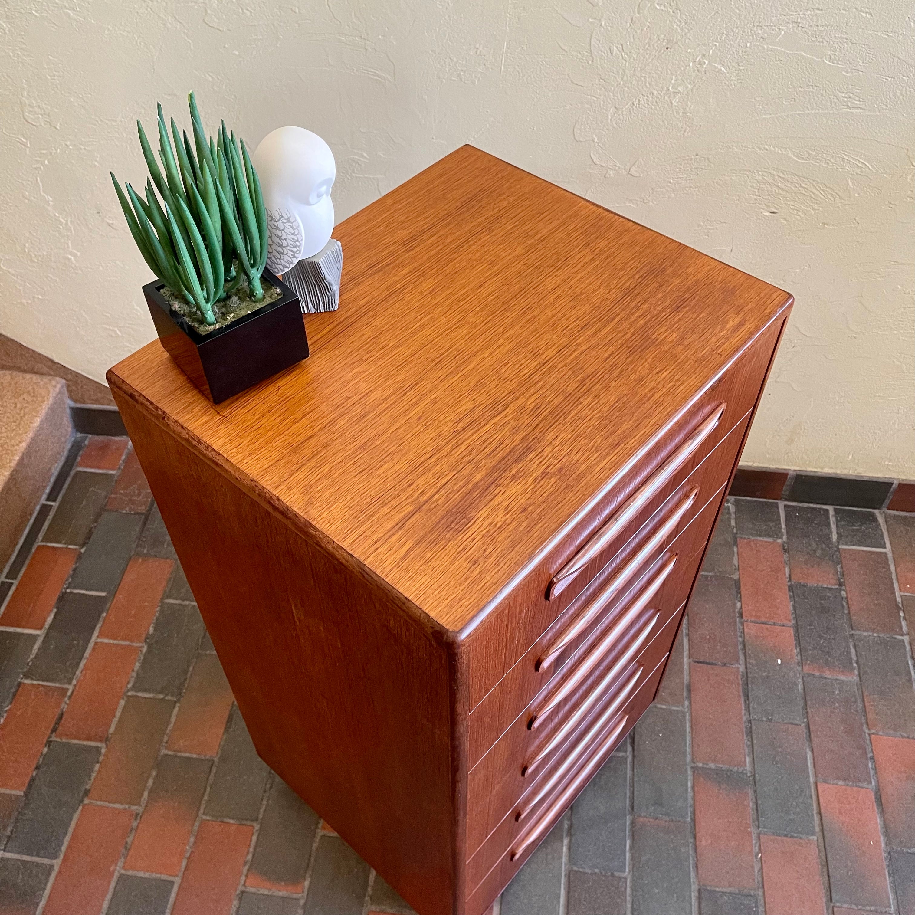 Top of vintage G Plan teak chest of drawers showing light surface wear and teak wood grain