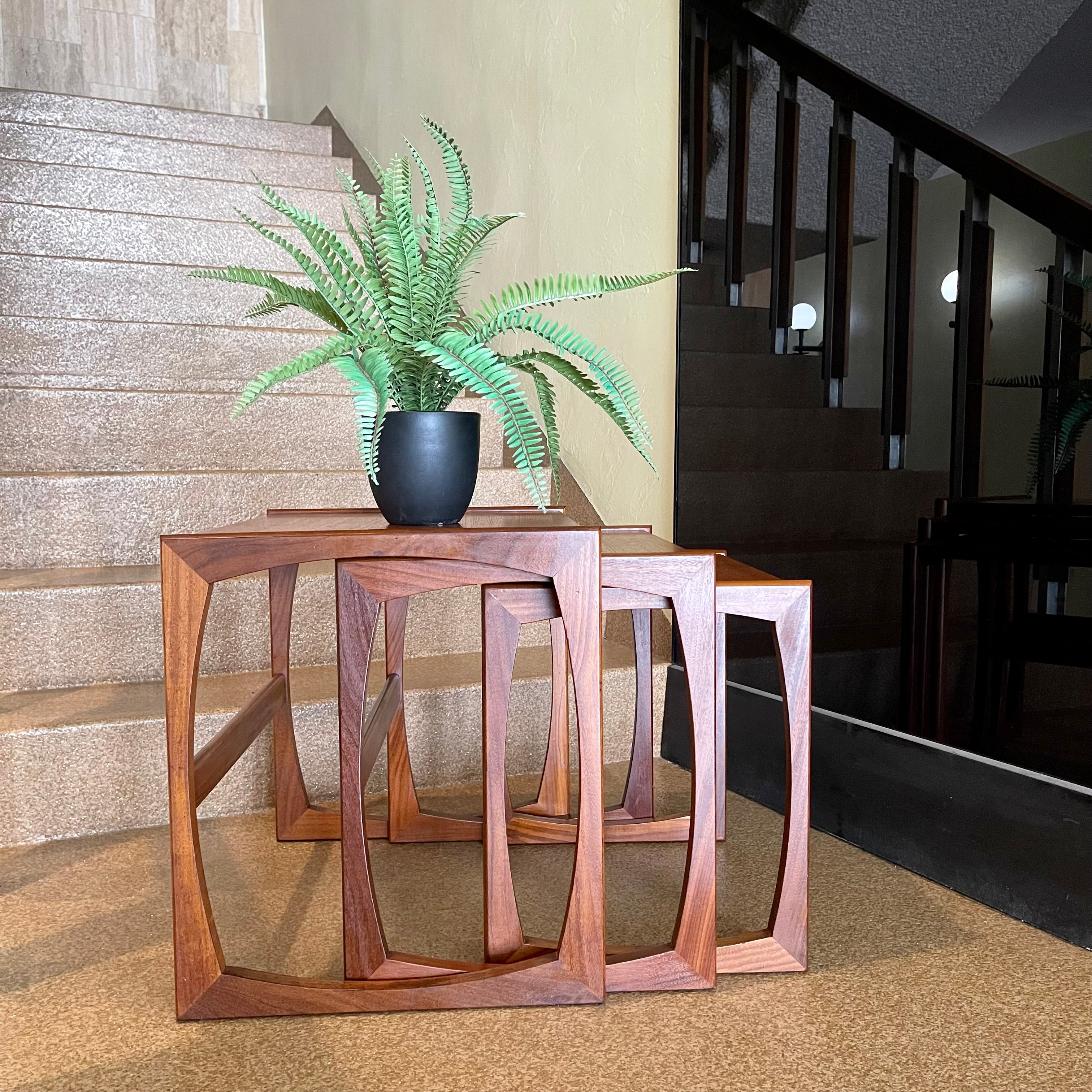Vintage Nesting Tables by E. Gomme for G-Plan&nbsp;Perfect for adding versatility to any living space, these nesting tables offer both style and functionality, serving as side tables or separate accents. 