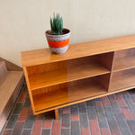 Load image into Gallery viewer,  Mid-century Teak Credenza | Hutch with Adjustable Shelving. This mid-century teak credenza | hutch is perfect for storing and displaying your items. Featuring two adjustable shelves, you can customize the configuration to suit your unique home. The timeless design is ideal for both office and home environments.
