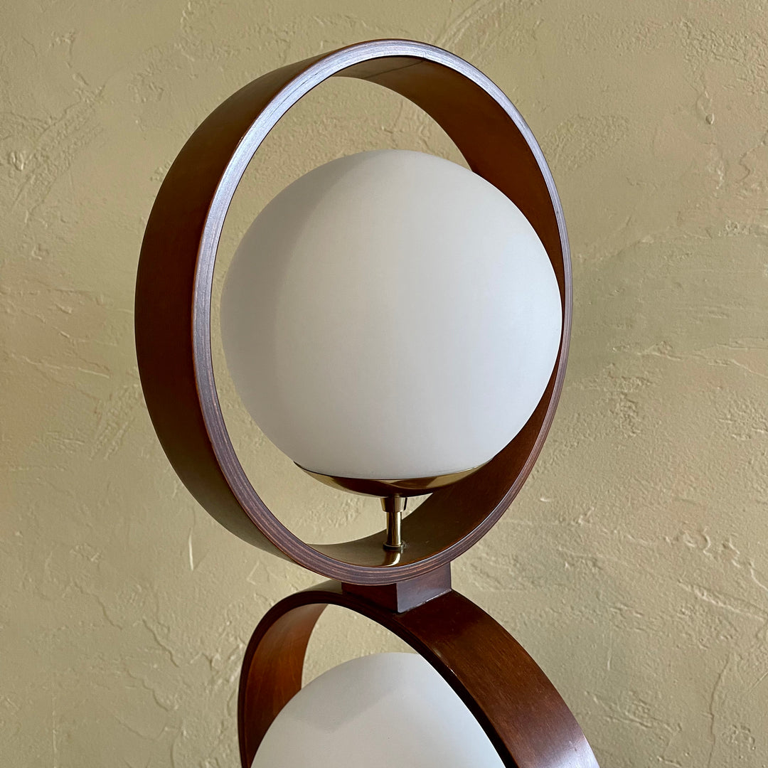 MODELINE Mid-Century Modern Globe Ring Lamp is a stunning three-tiered lighting fixture exuding a timeless Mid-Century Modern aesthetic. 