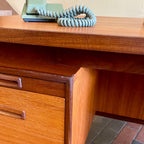 Left drawer corner wear on RS Associates executive teak desk