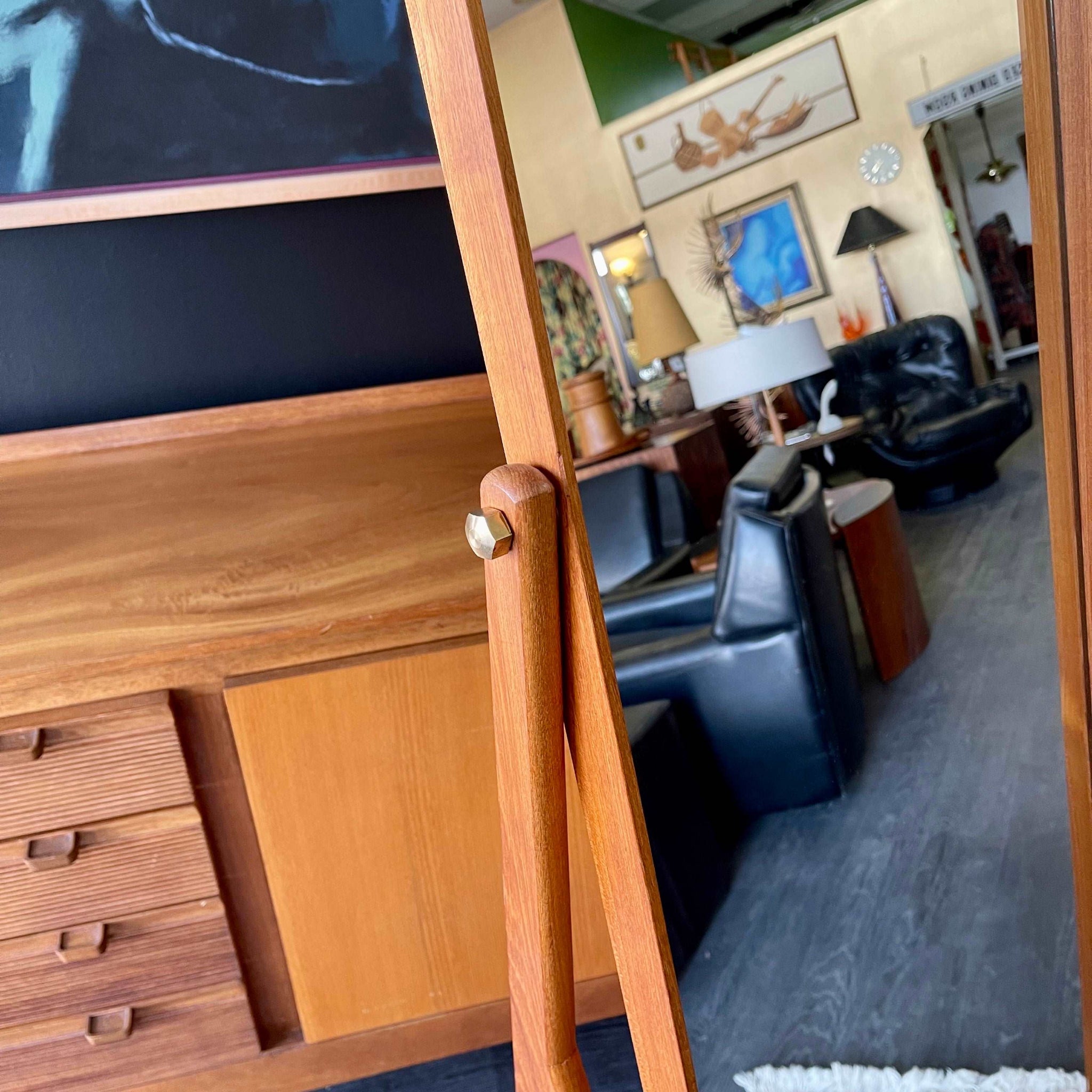 Tilting mirror hardware detail on Danish teak dressing mirror