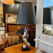 Richard Barr Brutalist Chrome Lamp for Laurel Lamp CoStanding as a testament to the Brutalist movement's influence on mid-century design, the lamp features a robust chrome base that exudes an air of strength and solidity. 