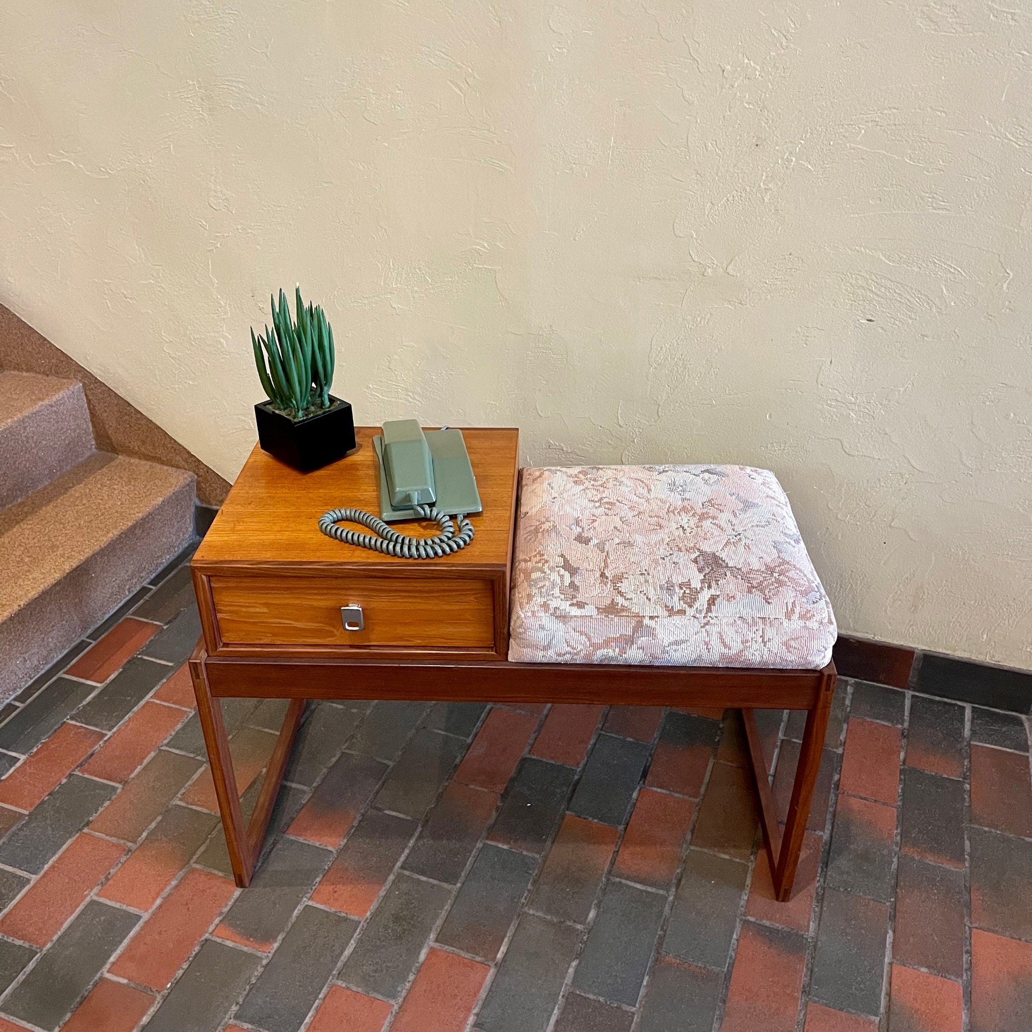 Top view of RS Associates teak telephone entranceway bench