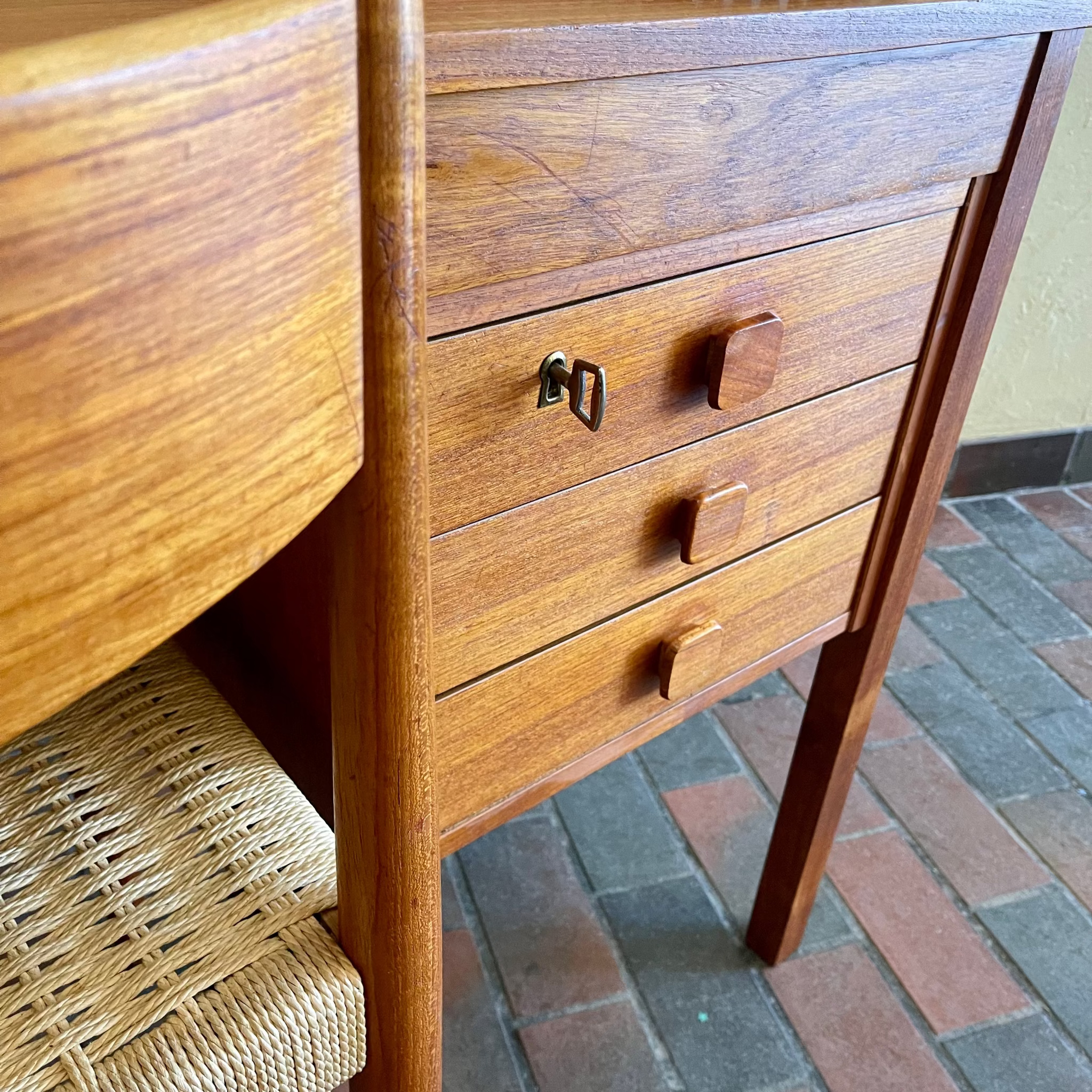 Original key detail on Danish teak desk