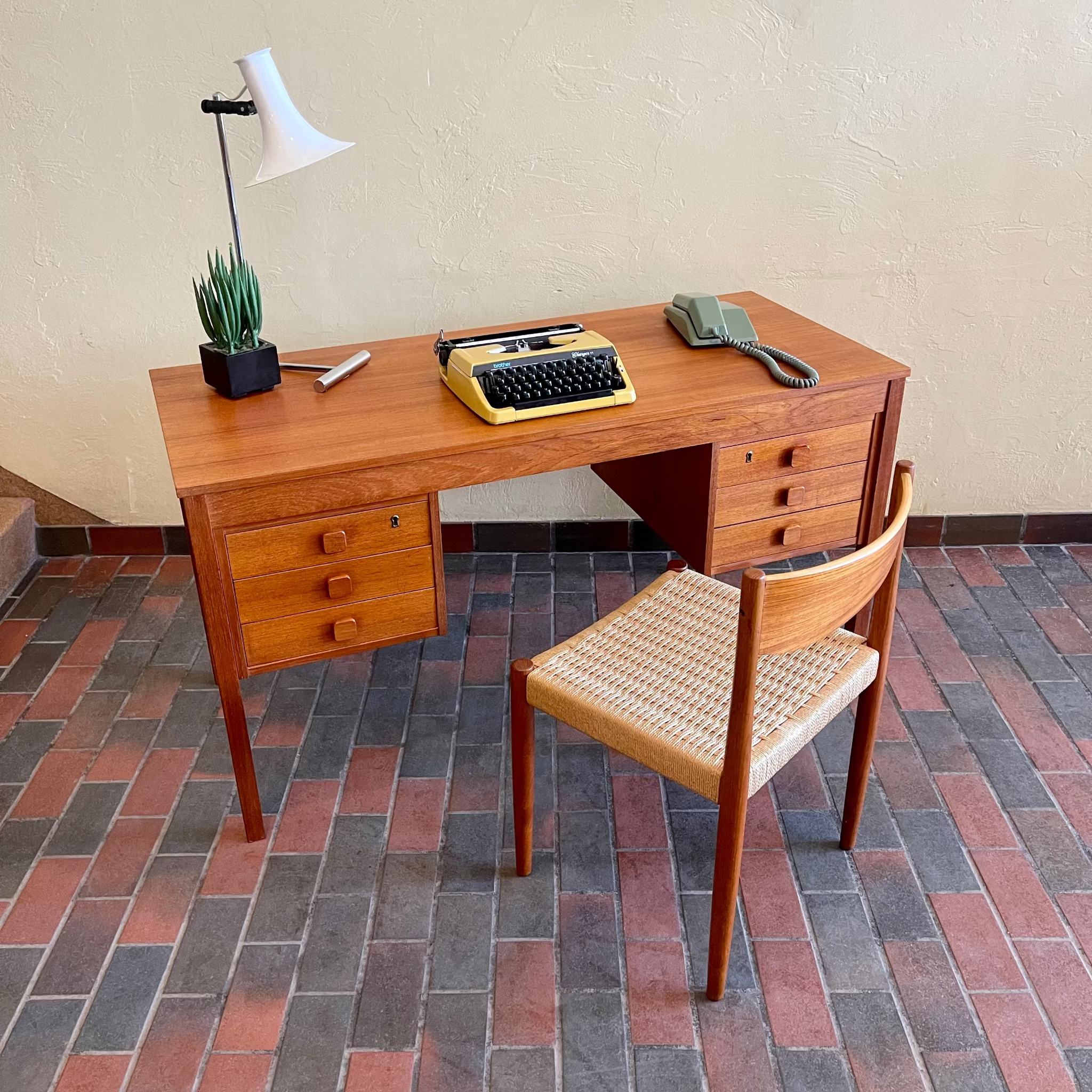 Domino Møbler teak desk with six dovetailed drawers