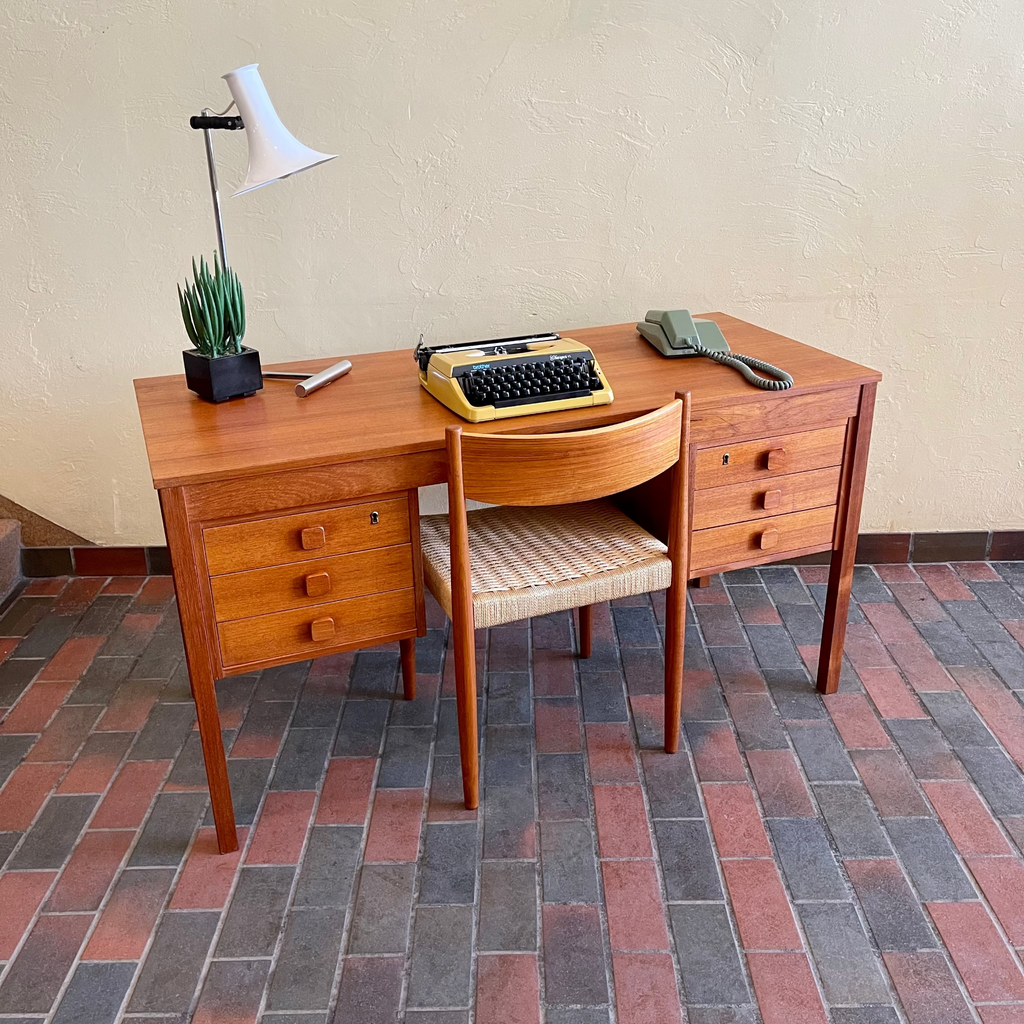 Danish teak desk by Domino Møbler with six dovetailed drawers