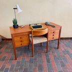 Danish teak desk by Domino Møbler with six dovetailed drawers