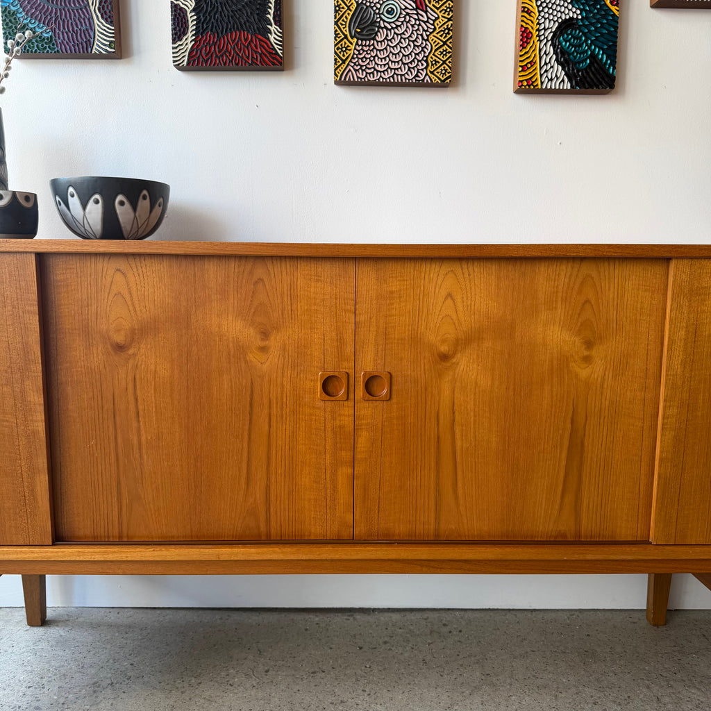 Sliding door handle detail on vintage teak sideboard