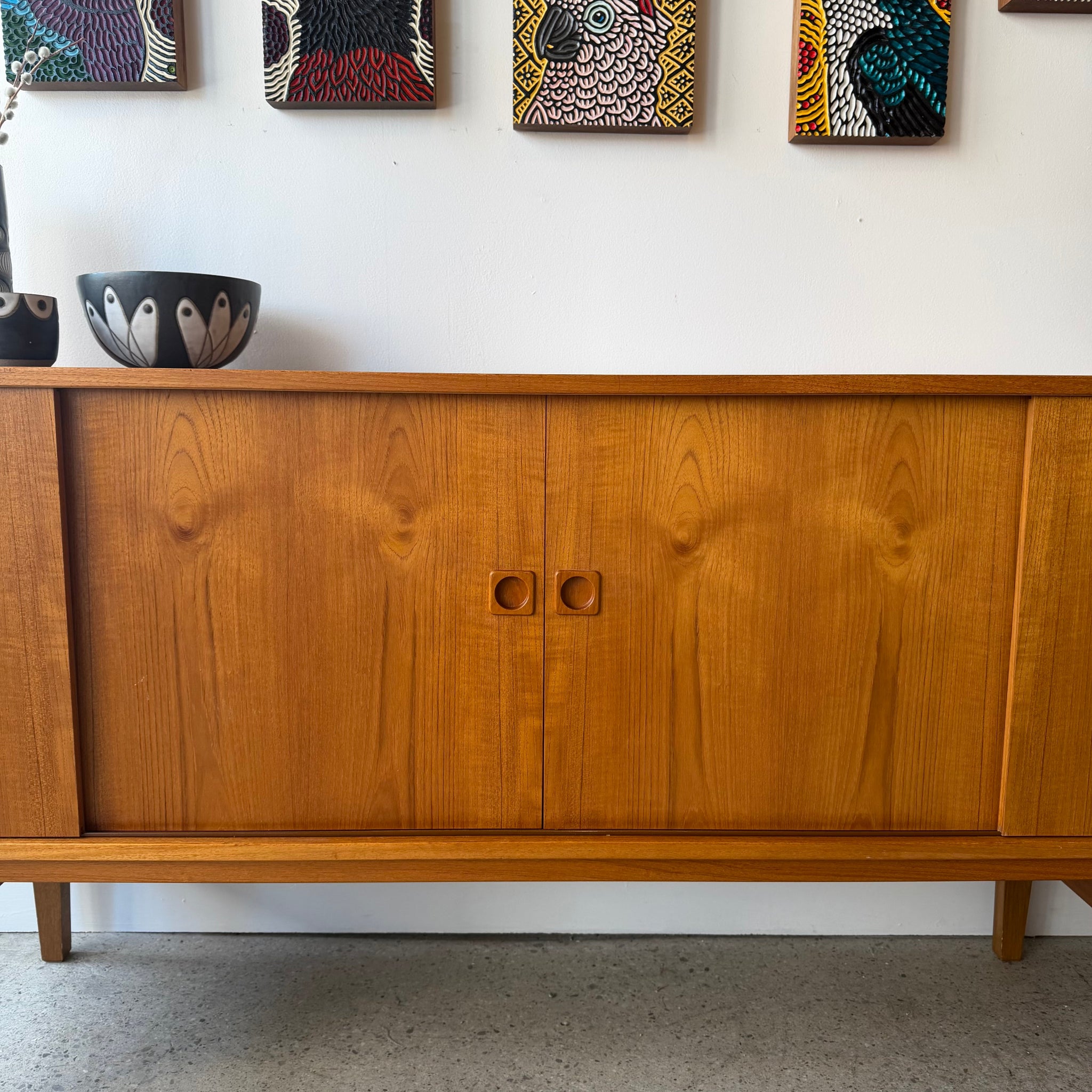 Sliding door handle detail on vintage teak sideboard