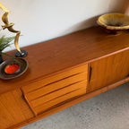 Sculpted teak handle detail on ACO Møbler sideboard