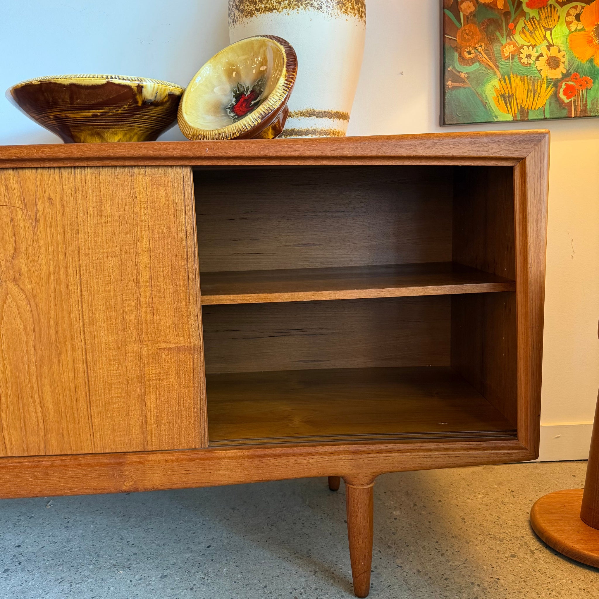 Sliding door storage on ACO Møbler teak sideboard