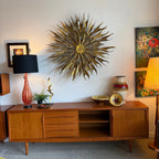 Open storage detail on Axel Christiansen teak sideboard
