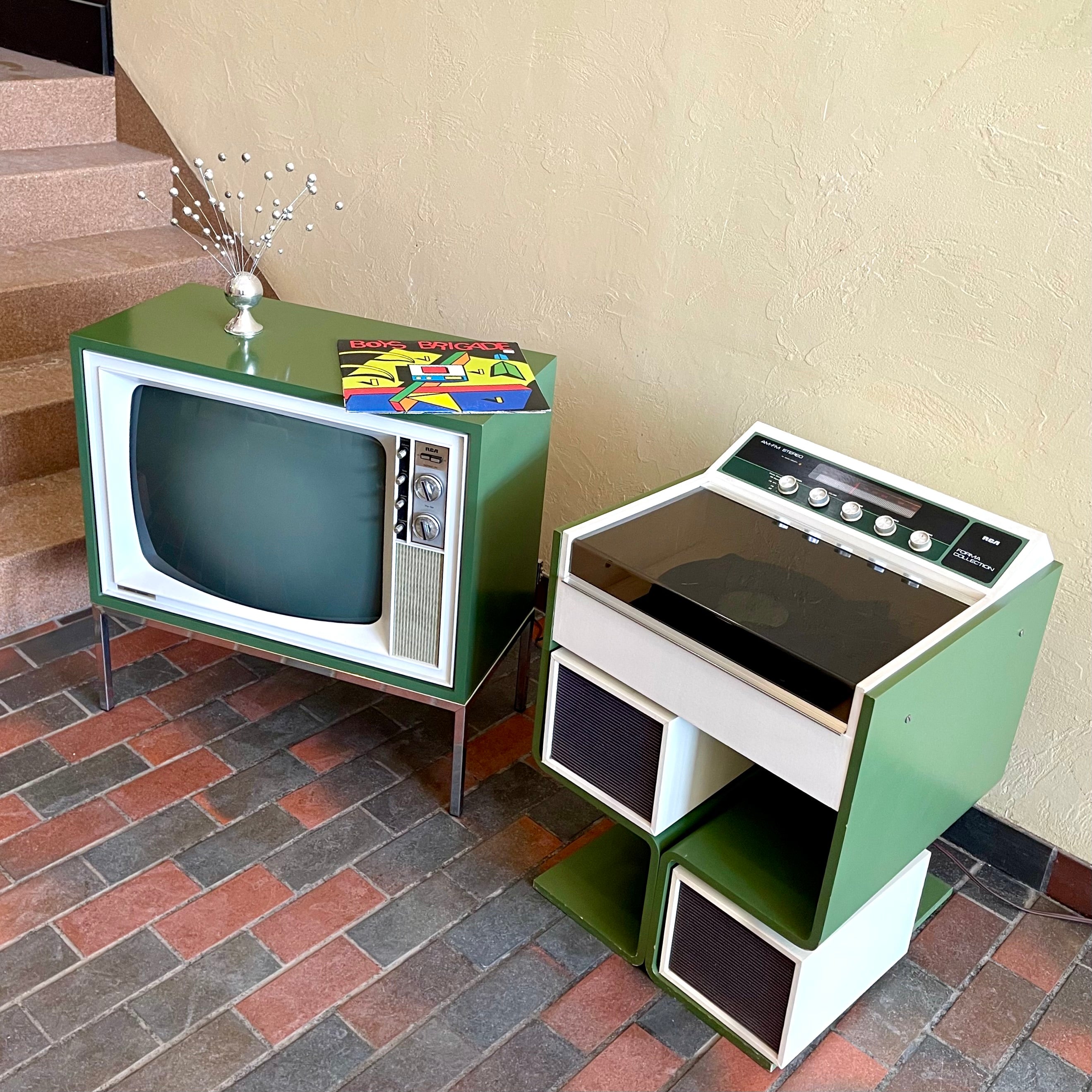 Vintage green space age forma collection rca tv on a metal stand and stereo