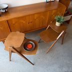 Two-tier tabletop detail on vintage wood side tables