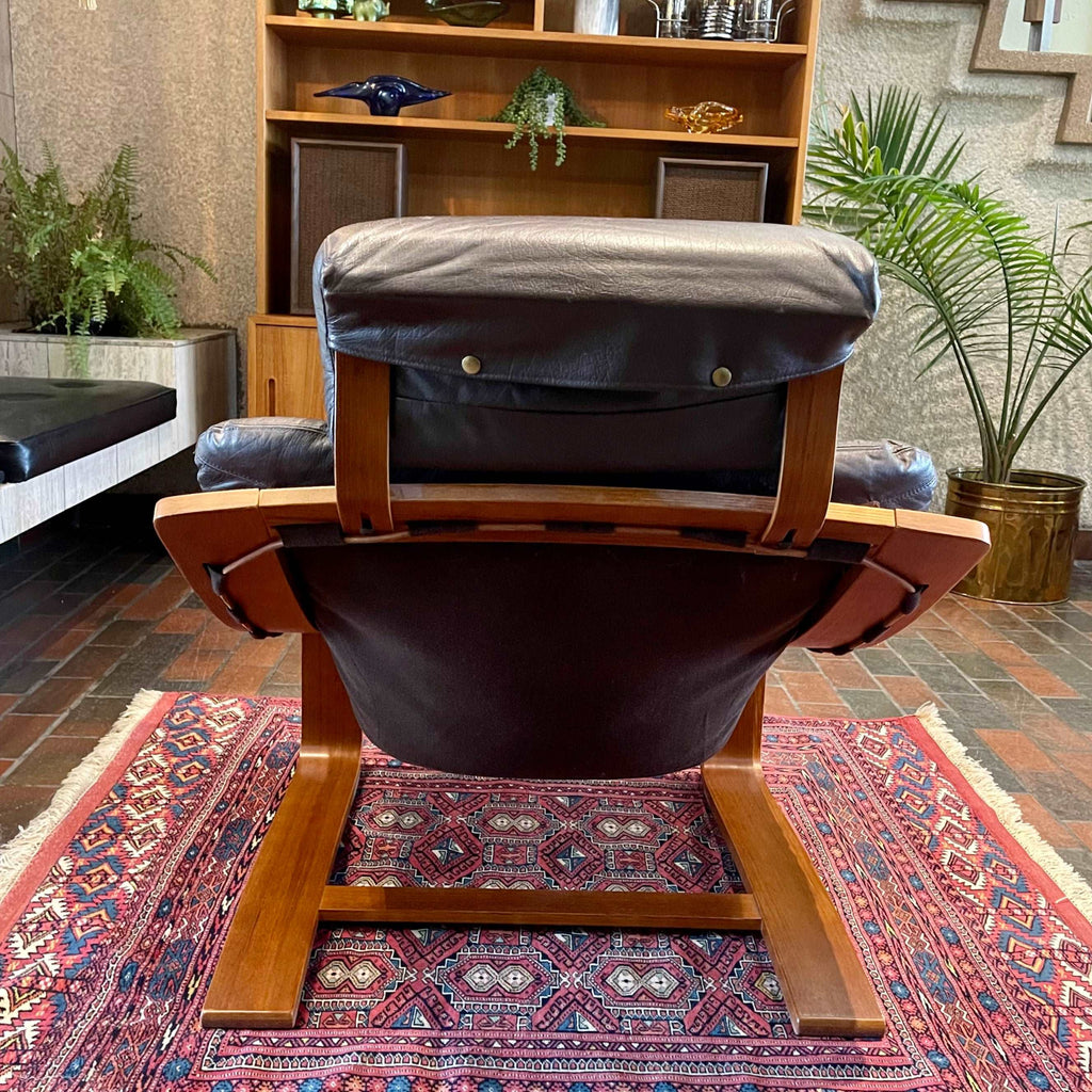 Rear view of Kroken lounge chair showing bentwood frame, leather sling seat and close-up of head rest.