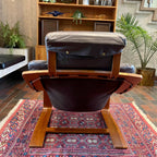 Rear view of Kroken lounge chair showing bentwood frame, leather sling seat and close-up of head rest.
