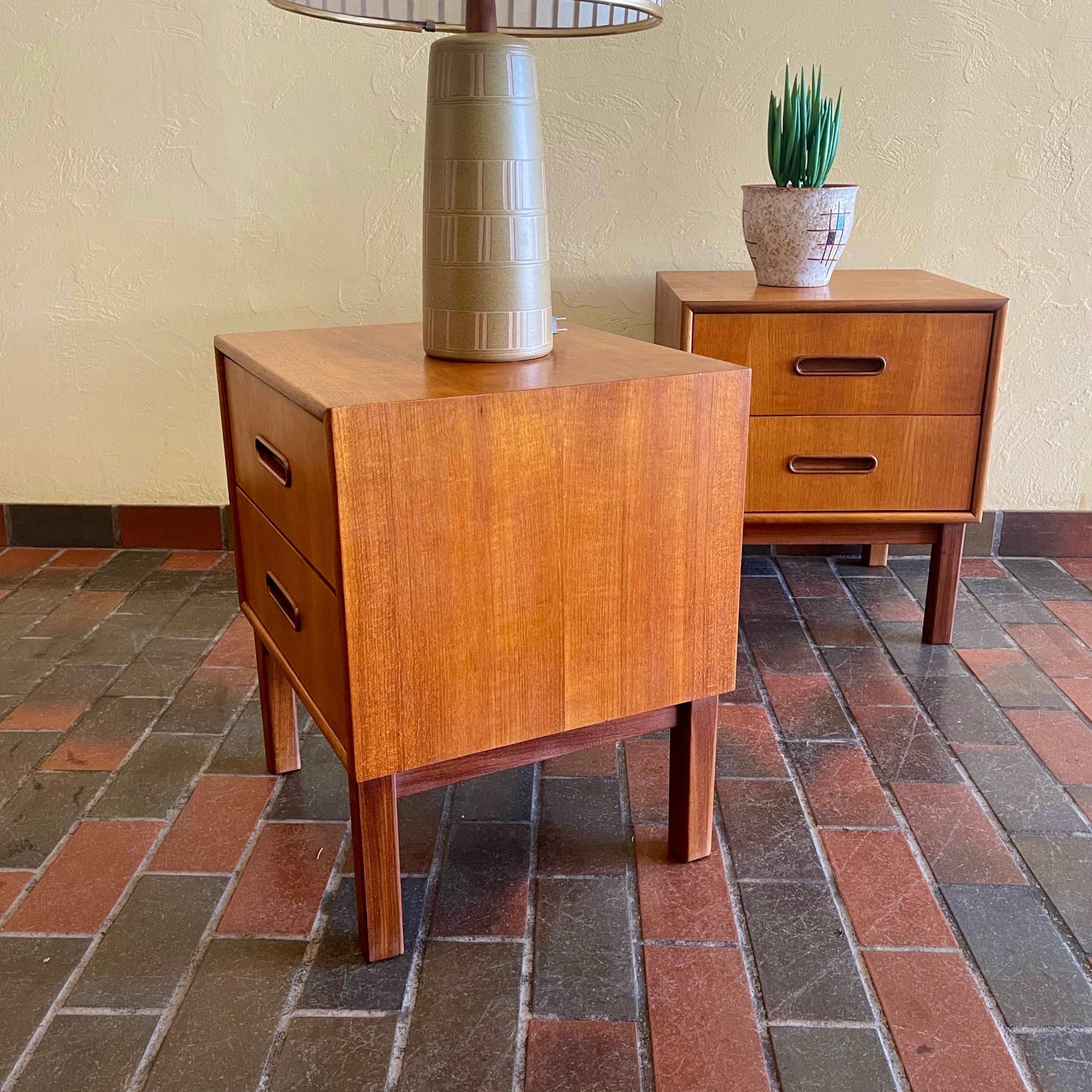 Side view of vintage teak nightstand showing compact depth and mid-century lines and leg detail