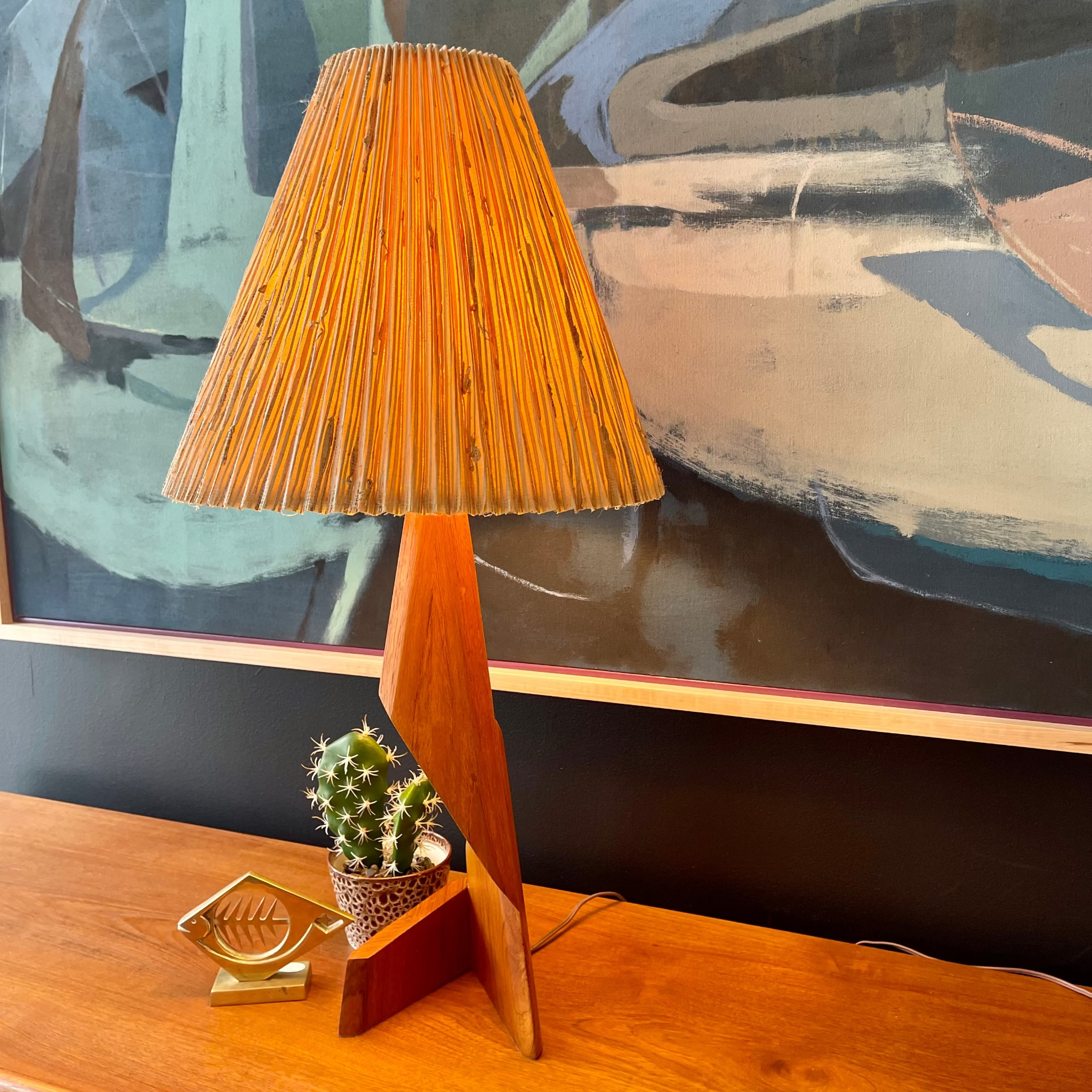 Side view of mid-century teak table lamp and shade