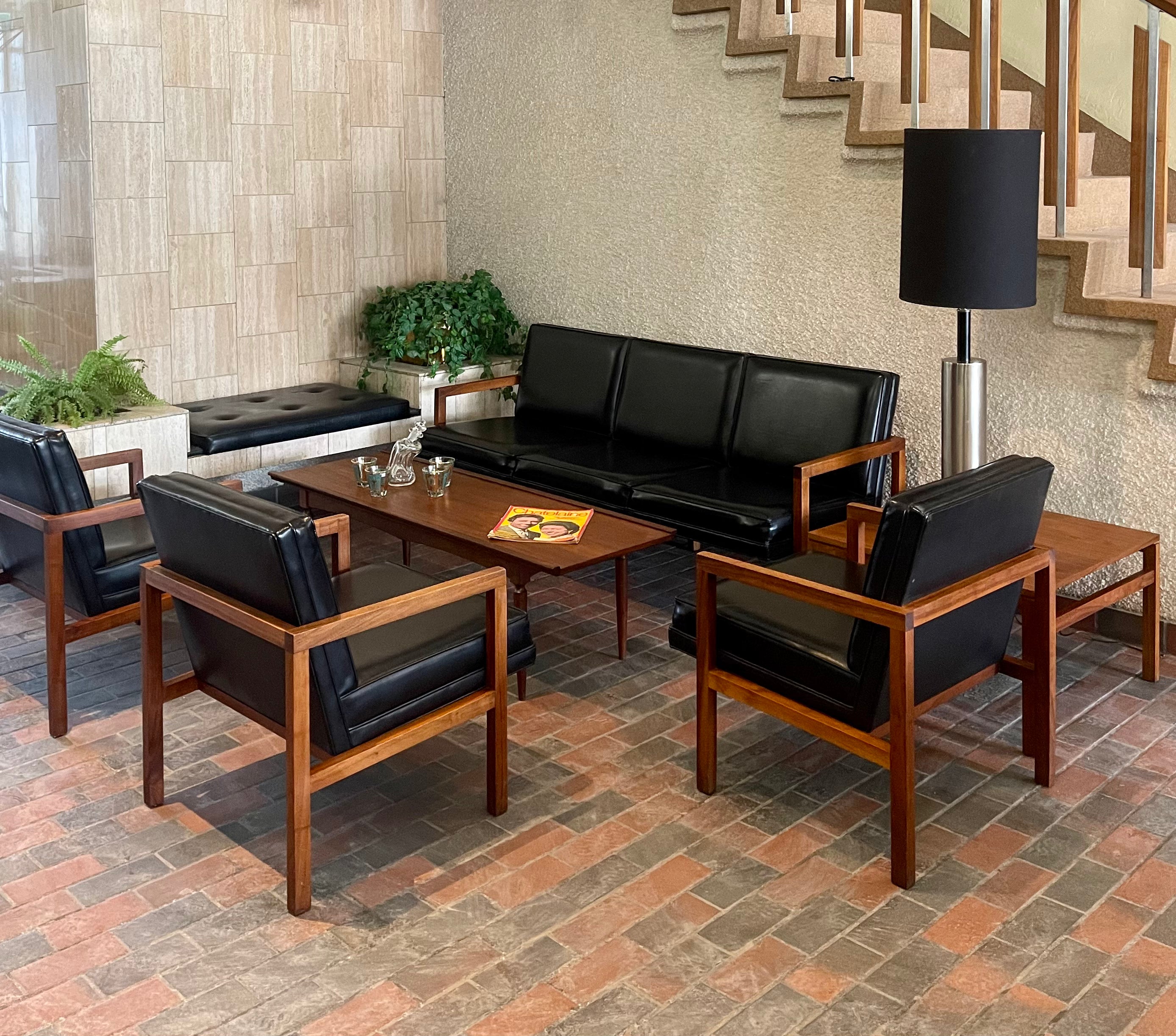 Vintage Mid-century Modern Office Furniture Set. One teak side table, three chairs one sofa in black vinyl and teak frames.  