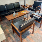 Vintage Mid-century Modern Office Furniture Set. One teak side table, three chairs one sofa in black vinyl and teak frames.  