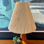 Close-up of shade on teak zig-zag lamp base