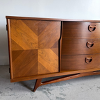 Close-up of walnut grain on VISCOL nine drawer dresser