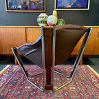 Indian rosewood frame and Chrome and tubular steel detail on Sonic lounge chair
